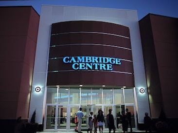 Front exterior of Cambridge Centre at dusk 